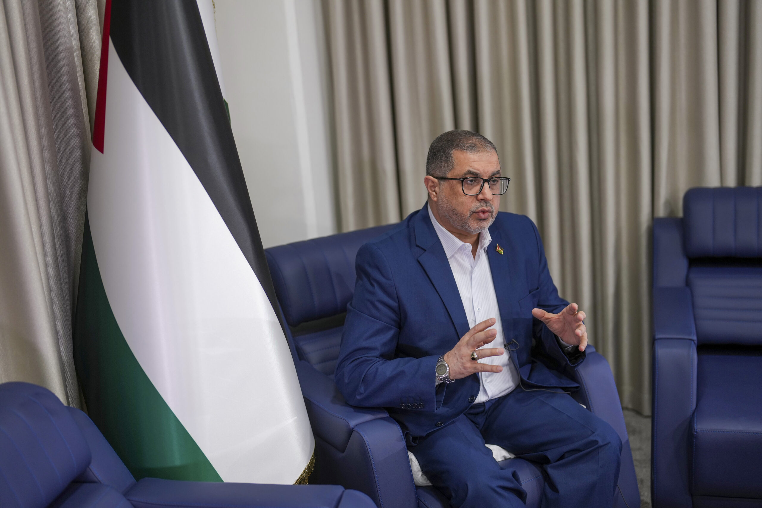 Bassem Naim, an official in Hamas' political wing, speaks in Istanbul, Turkey, Thursday, Dec. 5. (AP Photo/Francisco Seco)