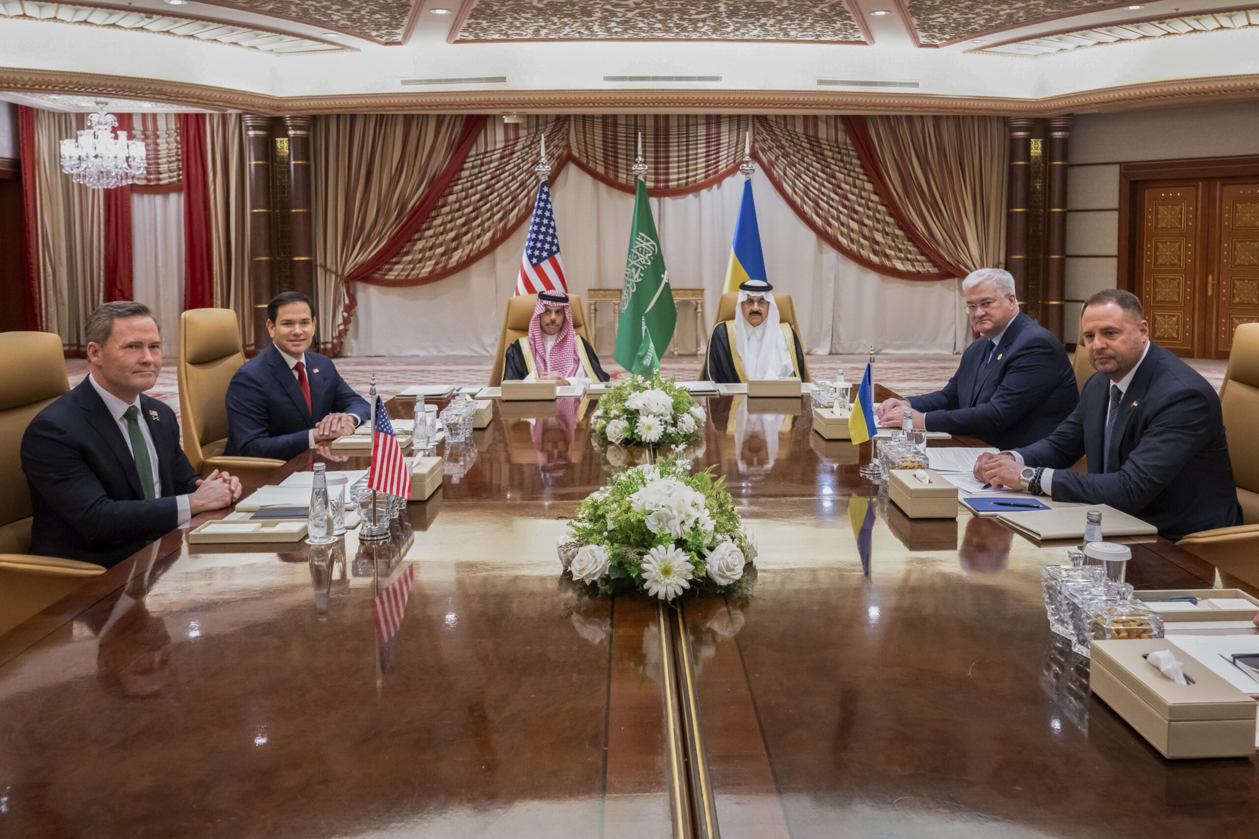 From left, U.S. National Security Advisor Mike Waltz, U.S. Secretary of State Marco Rubio, Saudi Foreign Minister Prince Faisal bin Farhan, Saudi National Security Advisor Musaad bin Mohammad al-Aiban, Ukrainian Foreign Minister Andrii Sybiha, and Ukrainian Head of Presidential Office Andriy Yermak hold a meeting in Jeddah, Saudi Arabia, March 11. (Saul Loeb/Pool Photo via AP)