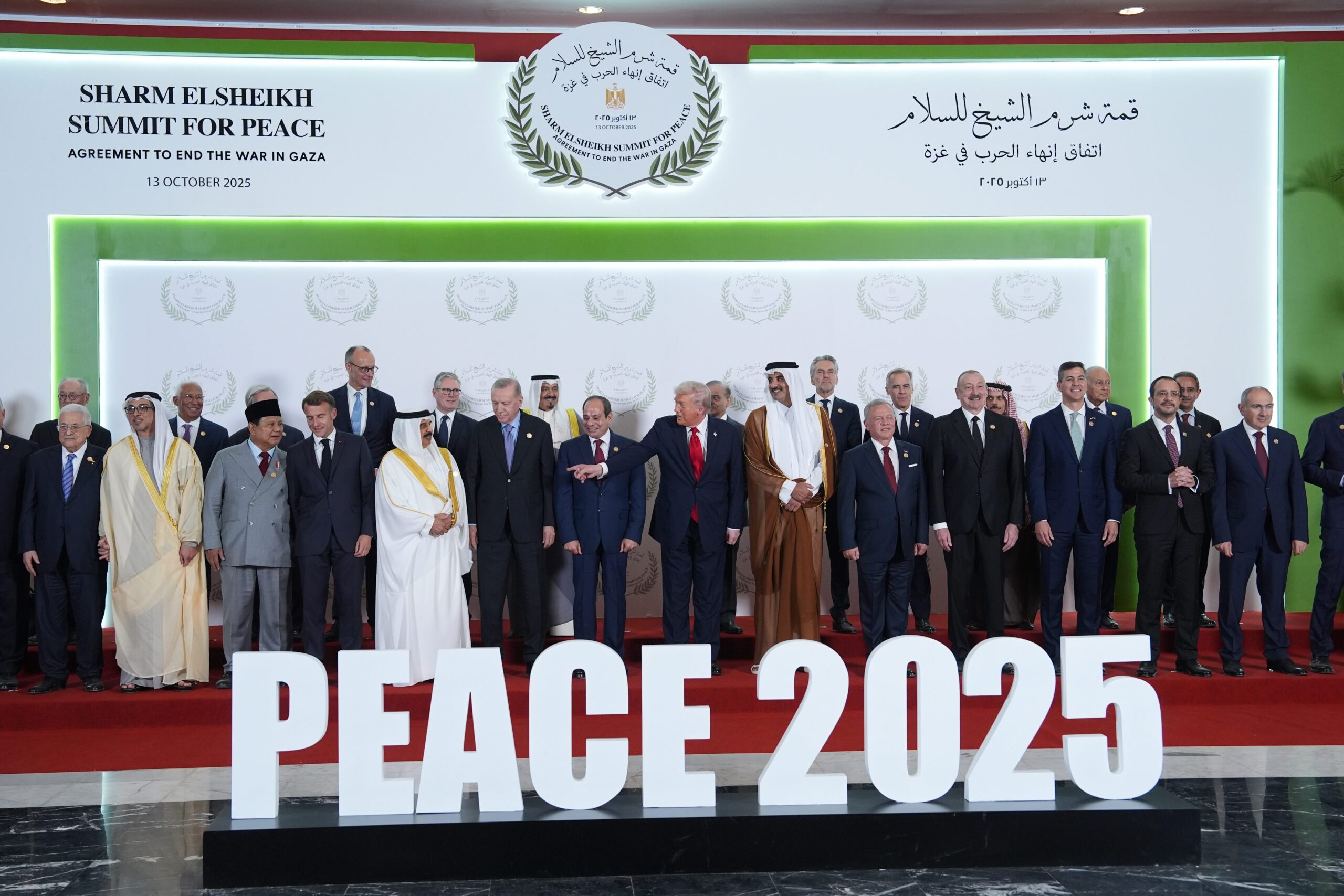 President Donald J. Trump and other leaders gather for a photo during a summit to support ending the Israel-Hamas war in Gaza after a breakthrough cease-fire deal, October 13, in Sharm El Sheikh, Egypt. (AP Photo/Evan Vucci, Pool)