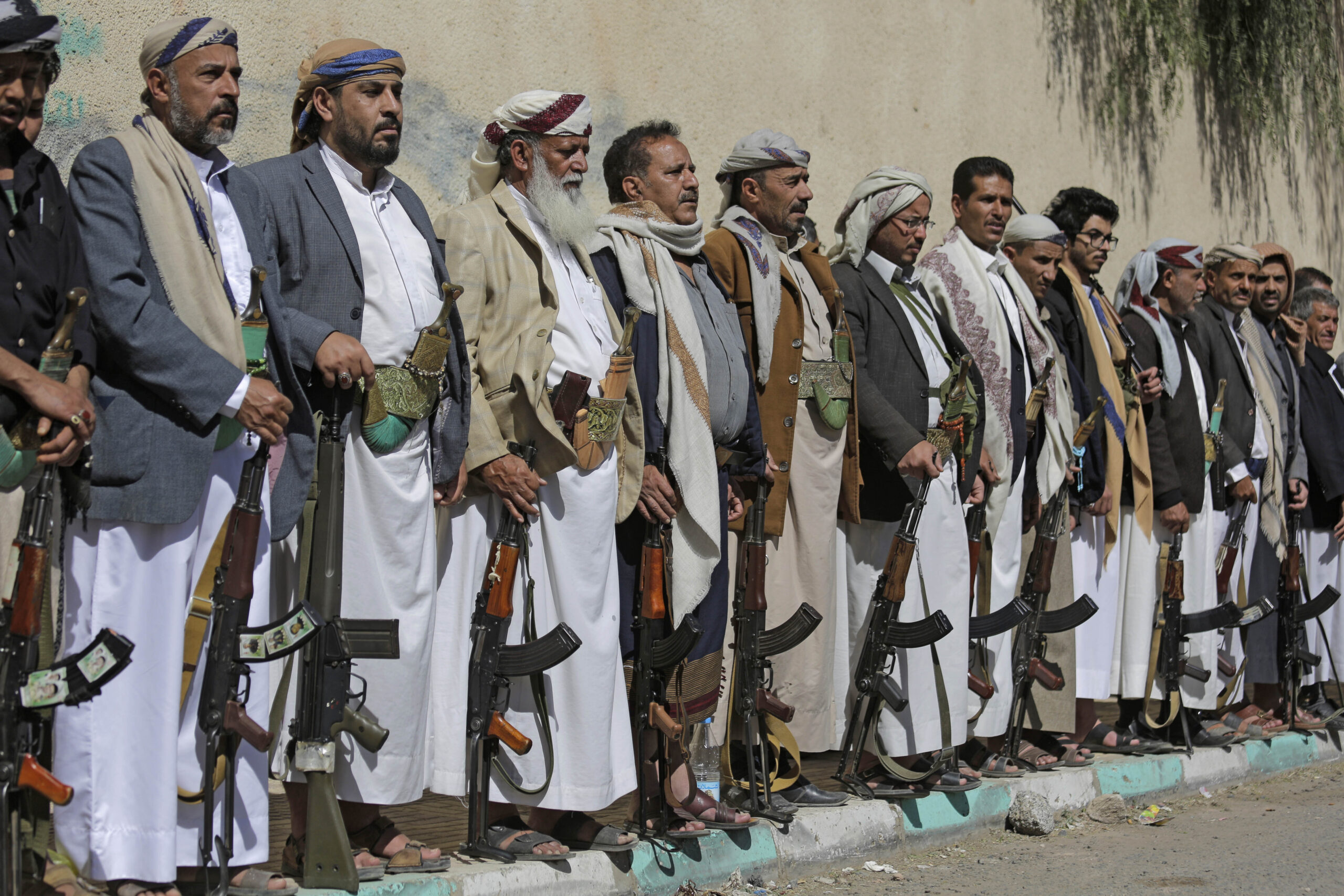 Tribesmen loyal to the Houthi rebels hold their weapons during a gathering aimed at mobilizing more fighters for the Houthi movement in Sanaa, Yemen, Feb. 25. (AP Photo/Hani Mohammed)