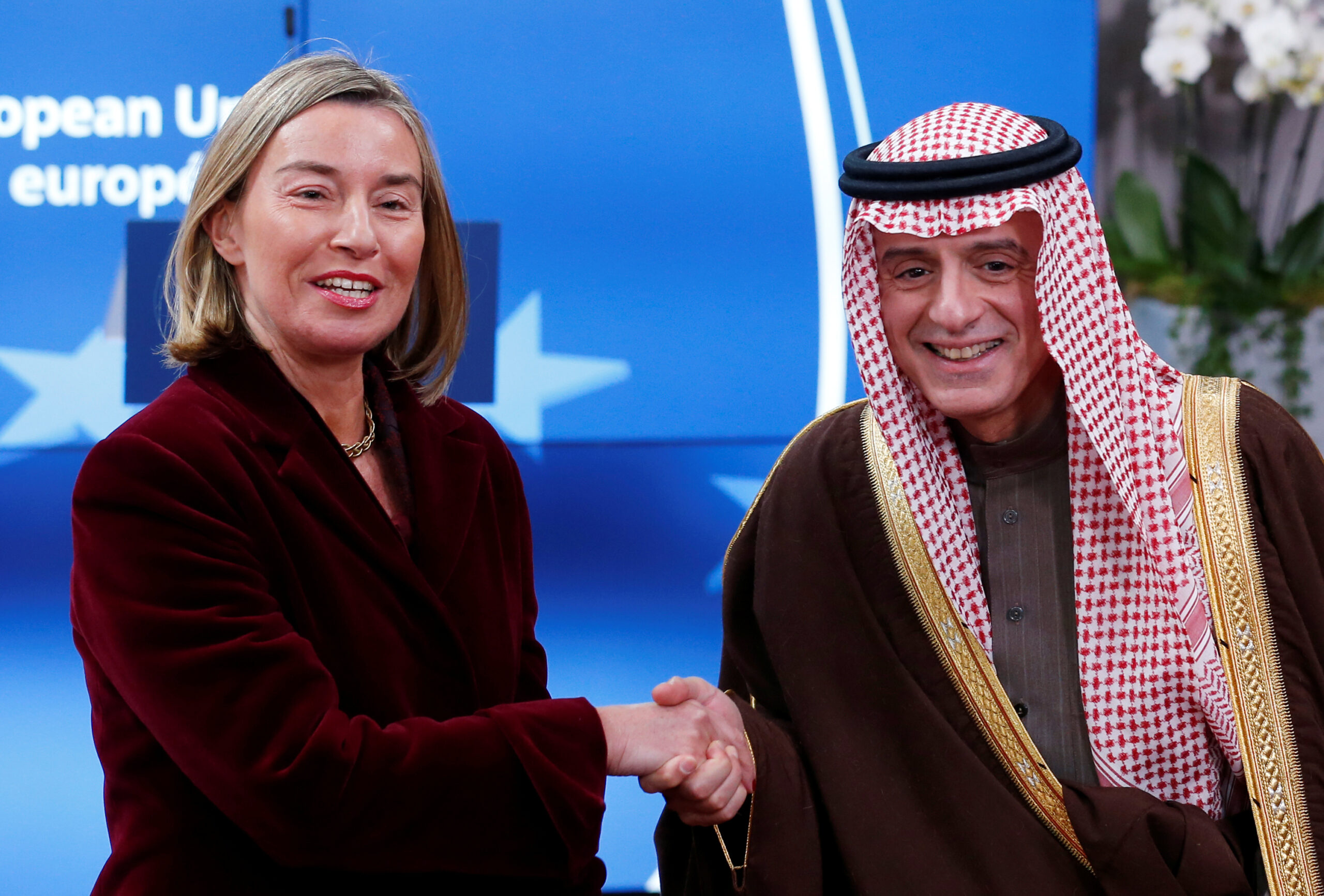 Federica Mogherini, then high representative of the European Union for foreign affairs and security policy, welcomes Saudi Foreign Minister Adel al-Jubeir ahead of a meeting in Brussels, Belgium, February 26, 2018. (REUTERS/Francois Lenoir)