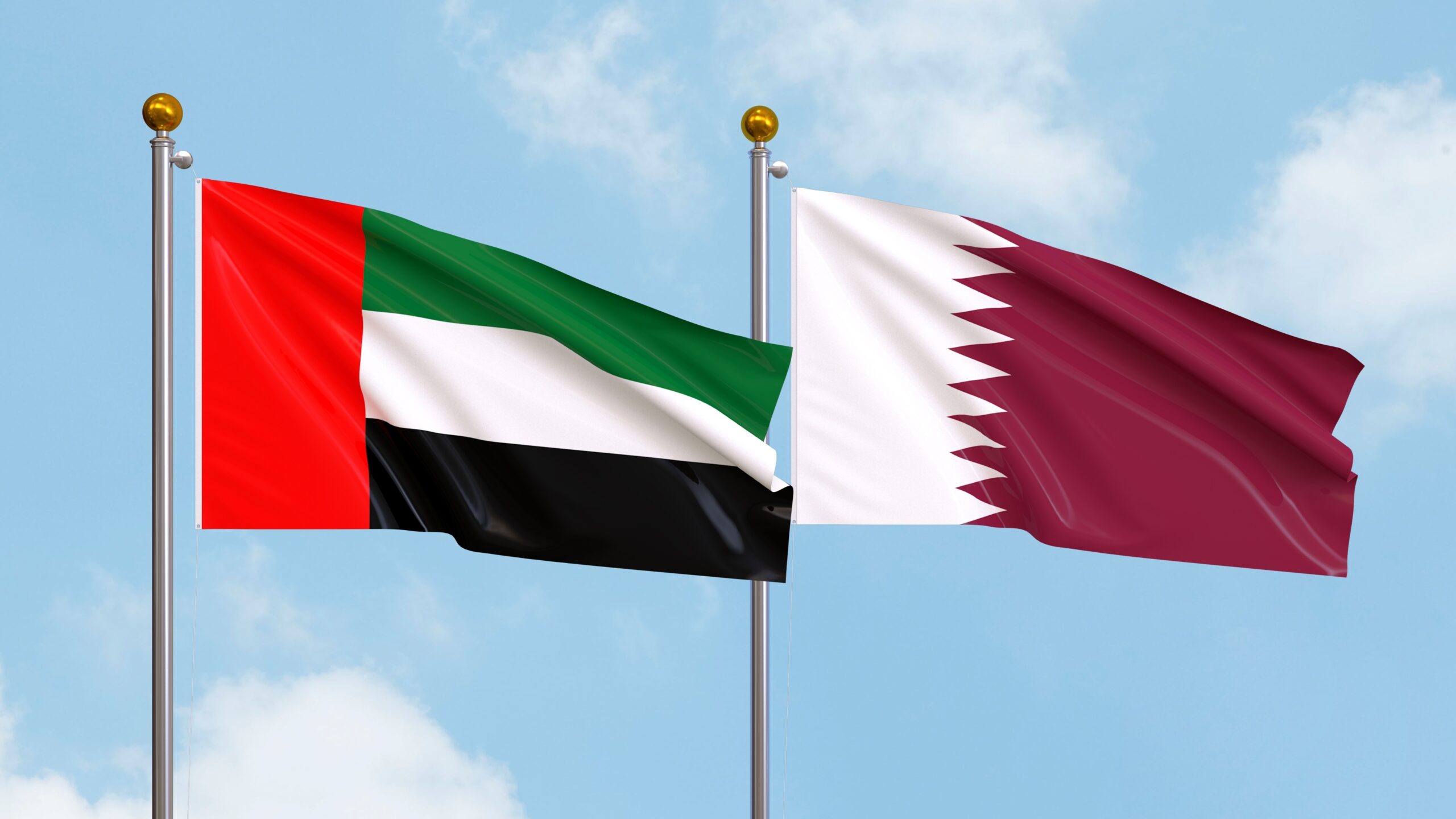 The Qatari and Emirati flags. (Shutterstock)